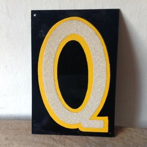 vintage reflective metal sign letter Q